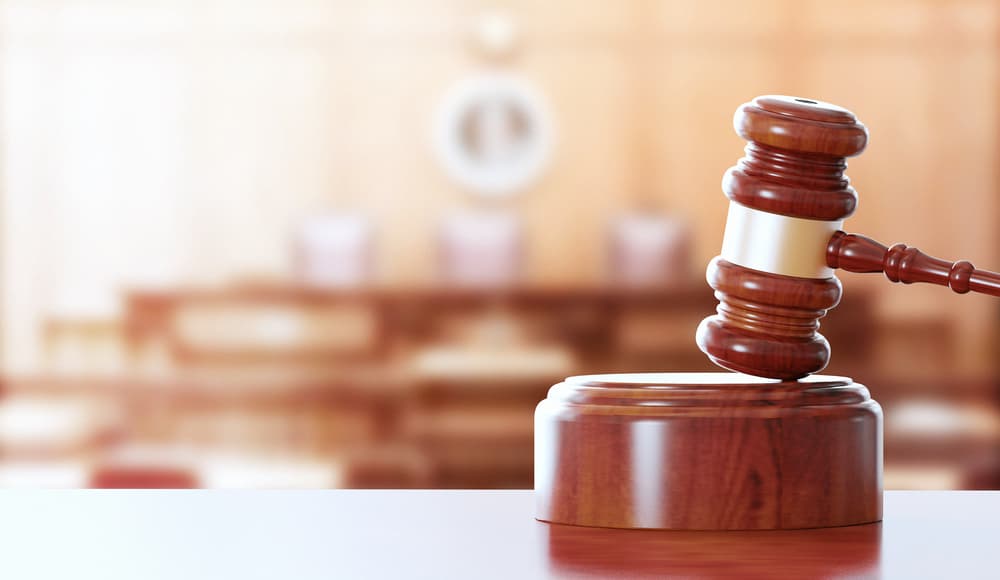 Filing a personal injury lawsuit offers you a chance to seek rightful compensation for your injuries. Justice is symbolized by the hammer, gavel, and scales.