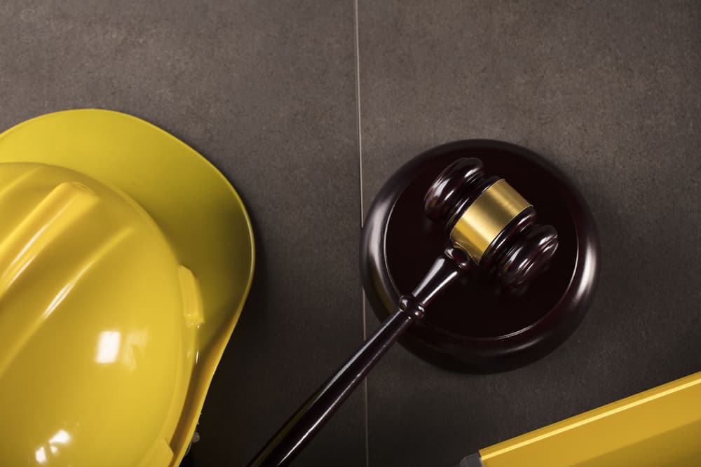 Construction law involves regulations and legal principles governing construction projects, ensuring safety, compliance, and accountability.
