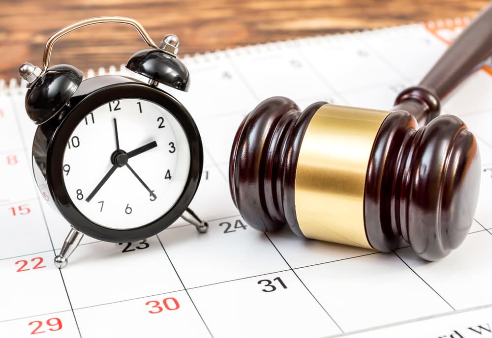desk withy calendar and gavel and clock
