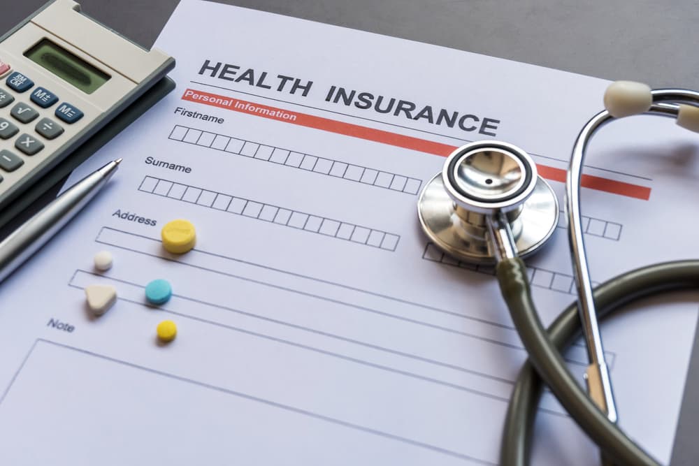 Health insurance form, policy document, and model form.